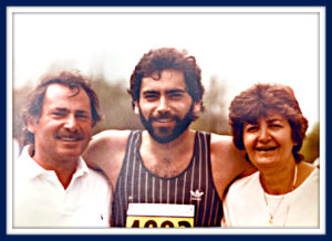 Proud Marathon runner with parents